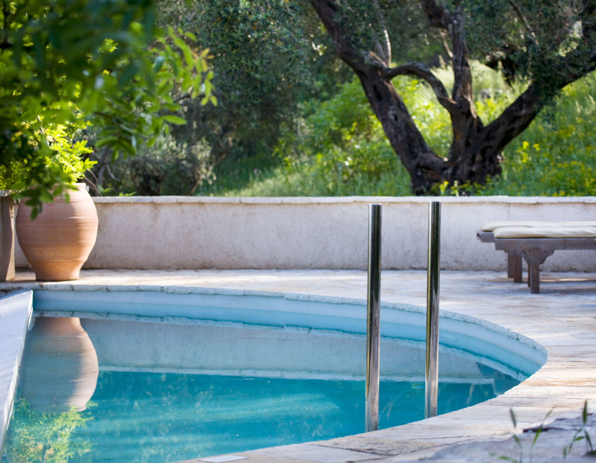 THE ROU ESTATE, CORFU: DAWN LIGHT ON THE PLUNGE POOL AND THE SWIMMING POOL
