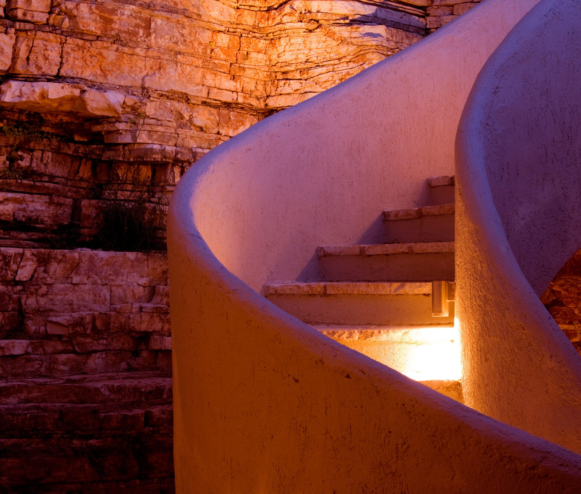 THE ROU ESTATE, CORFU STEPS BELOW THE SWIMMING POOL LIT UP AT NIGHT